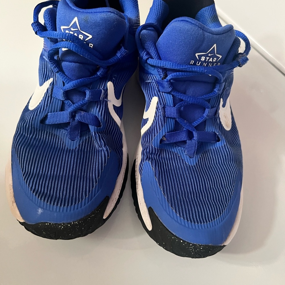 Nike Blue and White Sneakers with Lace-Up Design